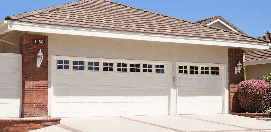 Residential garage door repair service for a double garage door in Los Angeles, CA