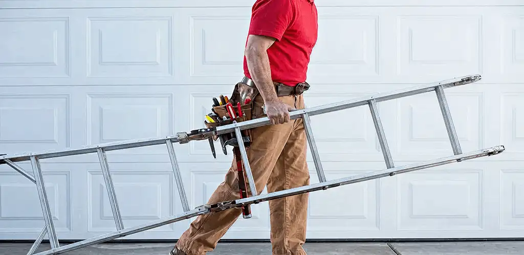Garage door repair technician arriving with tools and ladder in Los Angeles, CA