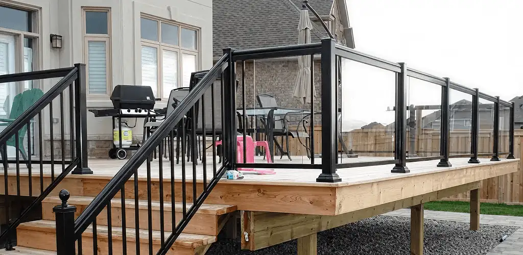 Handrail installation on a deck staircase for safety and code compliance in Los Angeles, CA