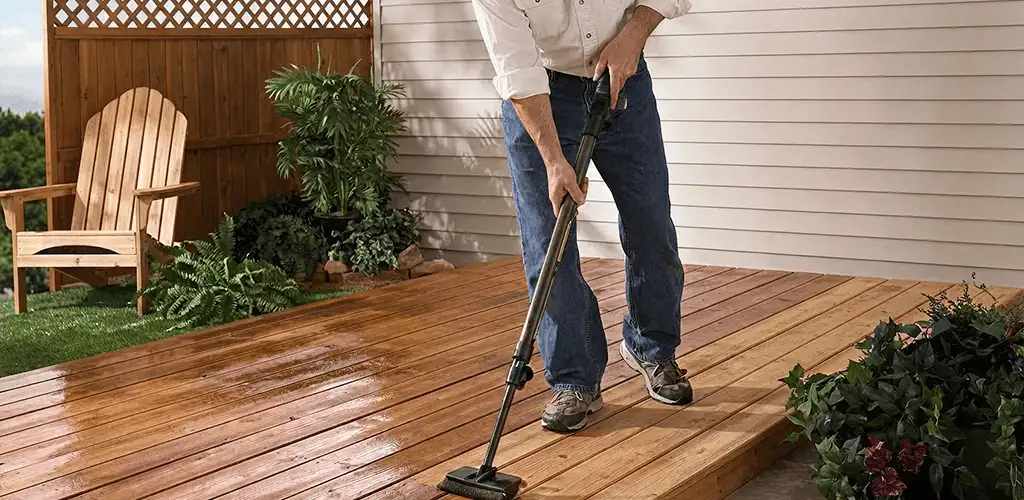 Deck staining service applying stain to a backyard wood deck in Los Angeles, CA